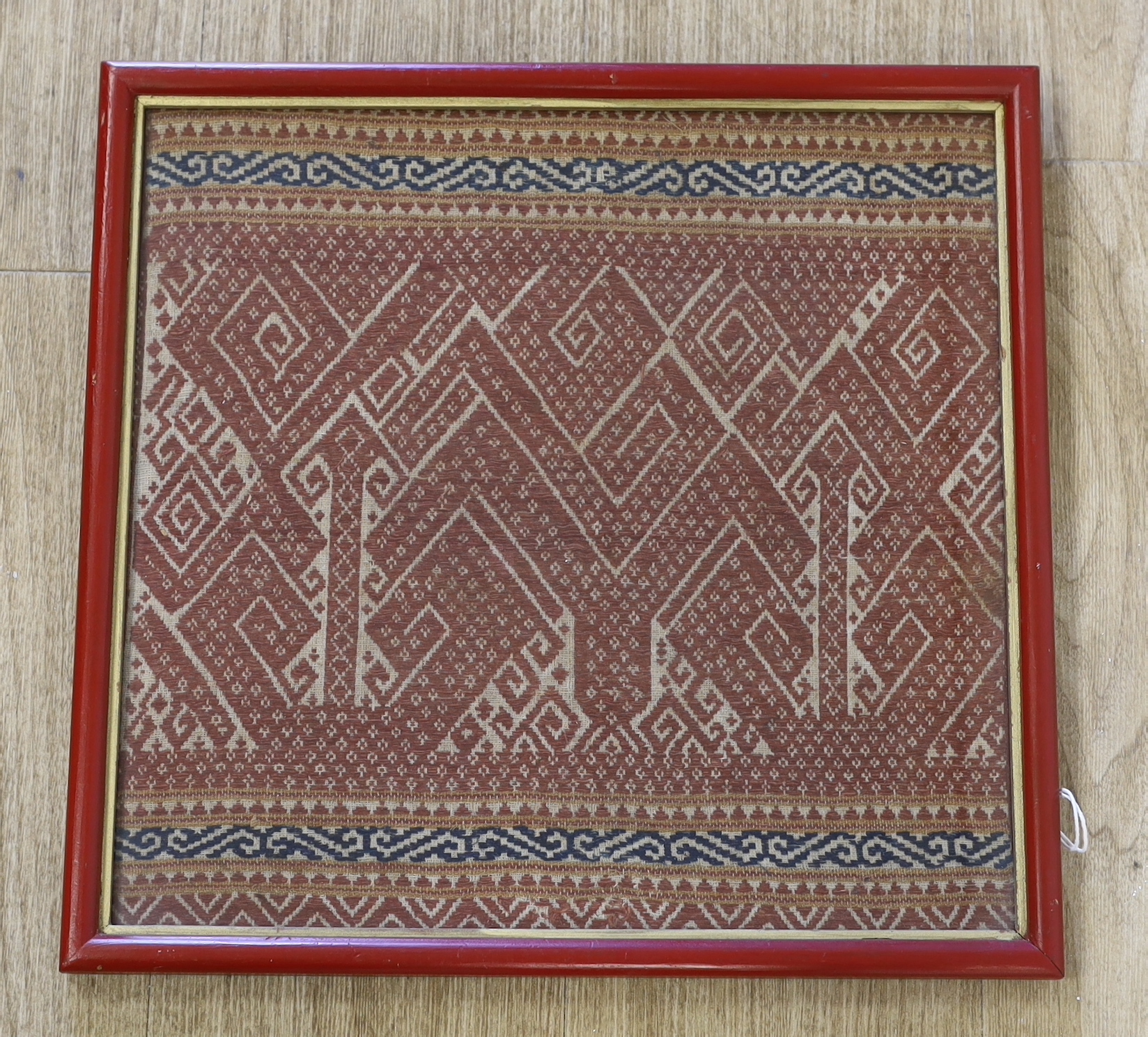 Two Indonesian framed woven panels, largest 44cm wide x 47 high